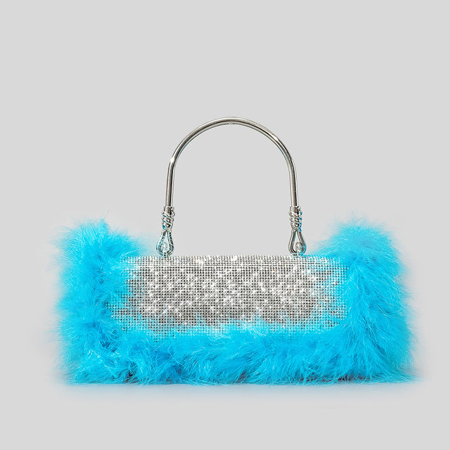 Pictured is Blue.  Crafted from high-quality acrylic, this clutch exudes sophistication while providing durability. Its medium size makes it ideal for various occasions, from dinners and banquets to parties, proms, evenings out, and even bridal events.  Adorned with popular elements such as rhinestone inserts and ribbon rhinestones, our clutch adds a touch of glamour to your outfit. The candy colors offer a playful yet chic aesthetic, ensuring you stand out in any crowd.