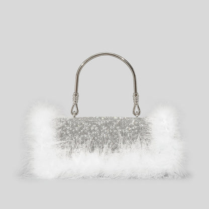 Pictured is the White Clutch Bag.  Crafted from high-quality acrylic, this clutch exudes sophistication while providing durability. Its medium size makes it ideal for various occasions, from dinners and banquets to parties, proms, evenings out, and even bridal events.